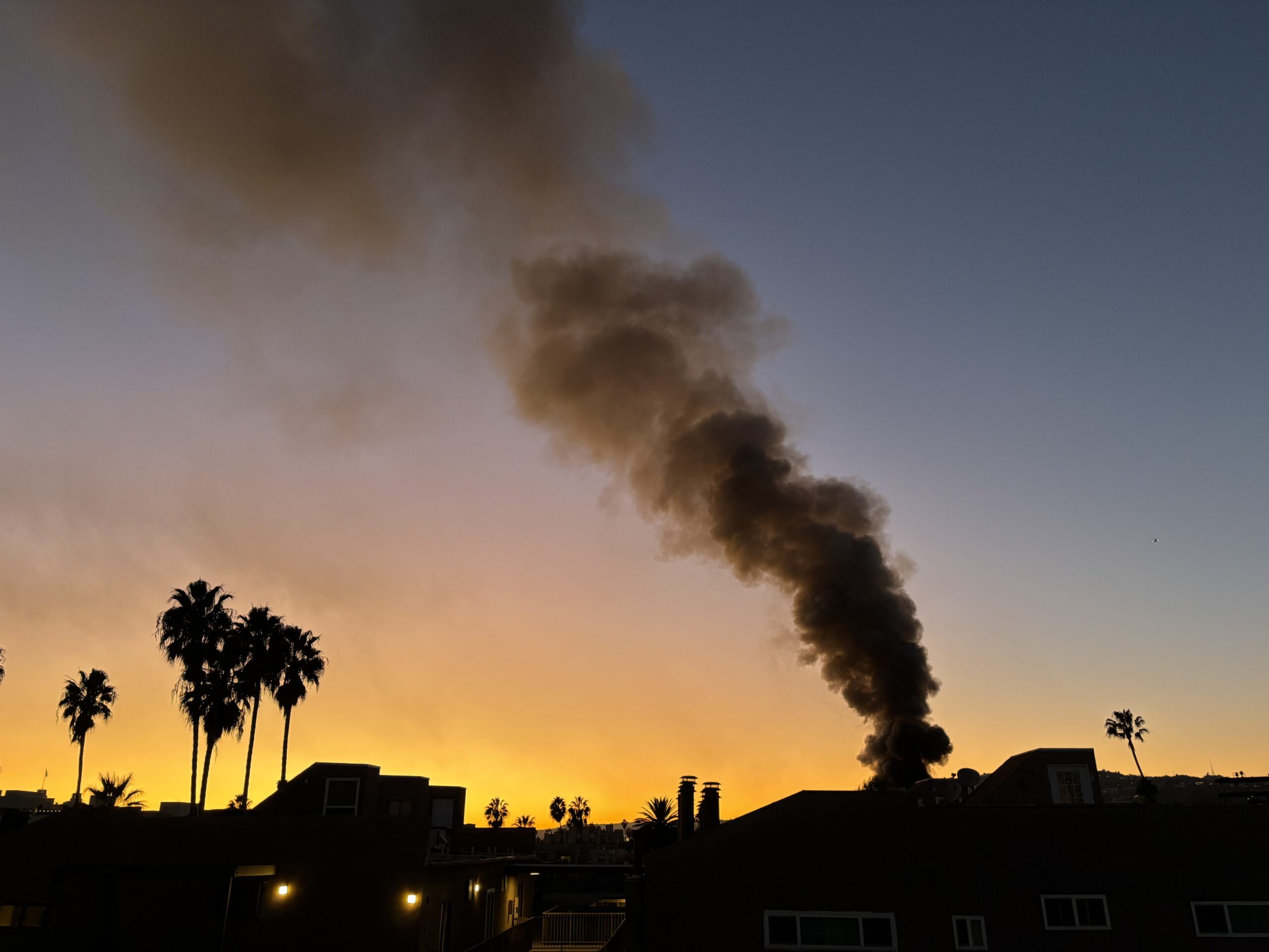 fire on horizon at sunset